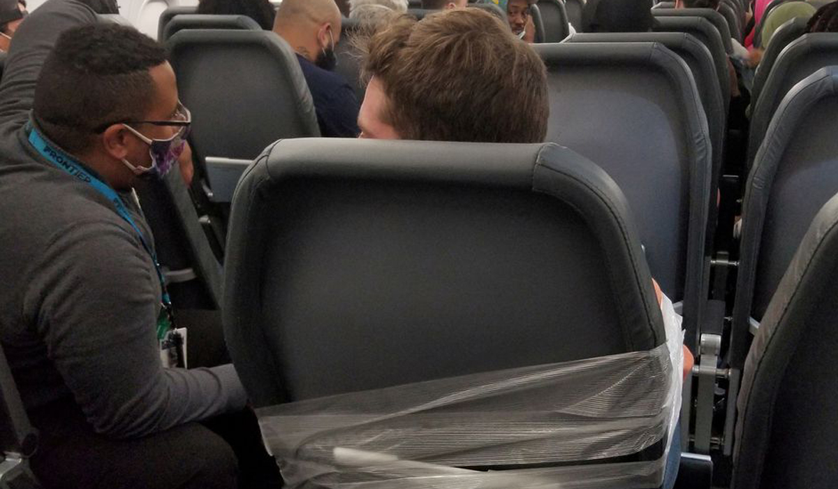 Frontier Airlines passenger taped to seat, arrested after altercation